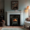 Chesneys Beaumont 8 series multi-fuel stove in Sage Green with the Langley fireplace