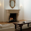 Chesneys Vicenza fireplace with the Ducksnest fire basket for dogs and Burton andirons