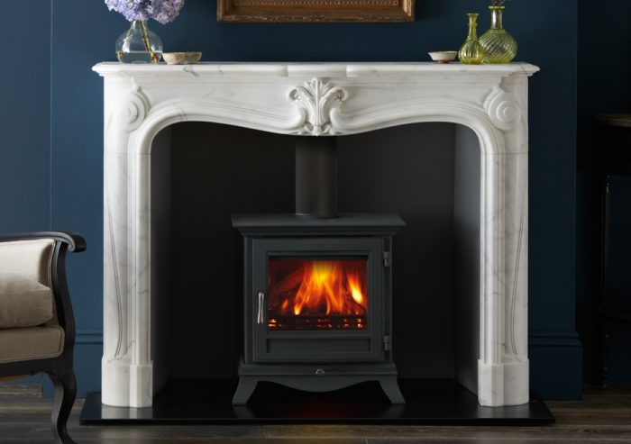 Chesneys Beaumont 5WS series wood burning stove in black anthracite with the La Rochelle fireplace
