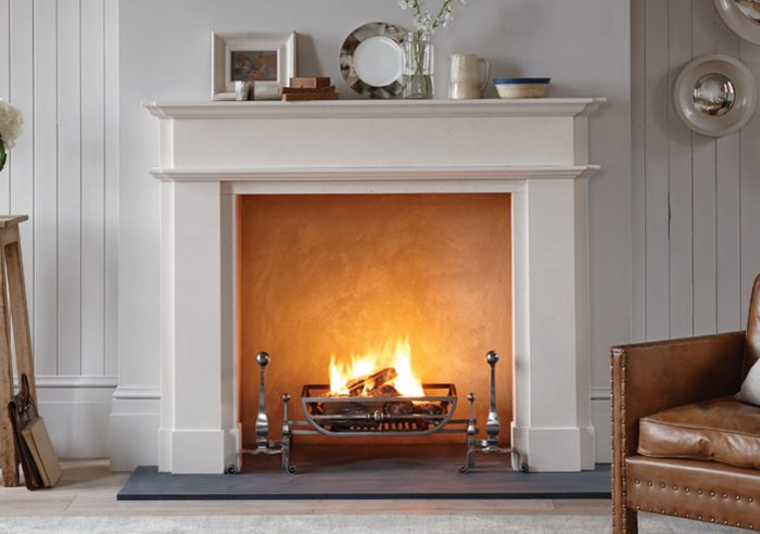 Chesneys Alhambra fireplace with the Morris fire basket for dogs and Burton andirons