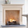 Chesneys Clandon fireplace with Burton forged steel andirons and the 22″ Swansnest fire basket for dogs