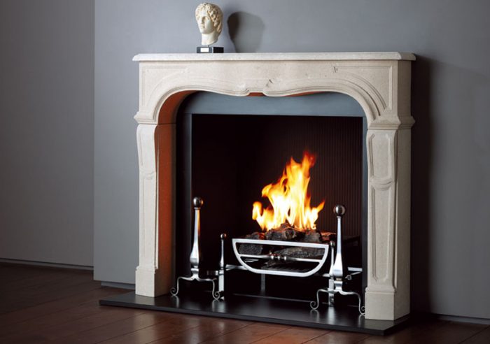 Chesneys Sorbonne fireplace with the Morris fire basket for dogs and Burton andirons