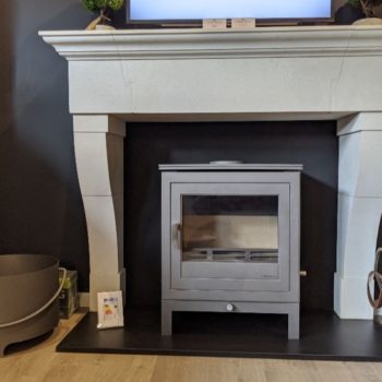 Chesneys Marseilles fireplace with the Shoreditch 8 series multi-fuel stove in silver at the showroom