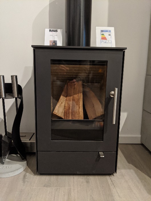 RAIS Q-Tee 65 wood burning stove in showroom