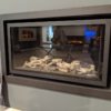 Stovax & Gazco Studio 1 gas fire Profil frame, log effect and black reeded lining in showroom